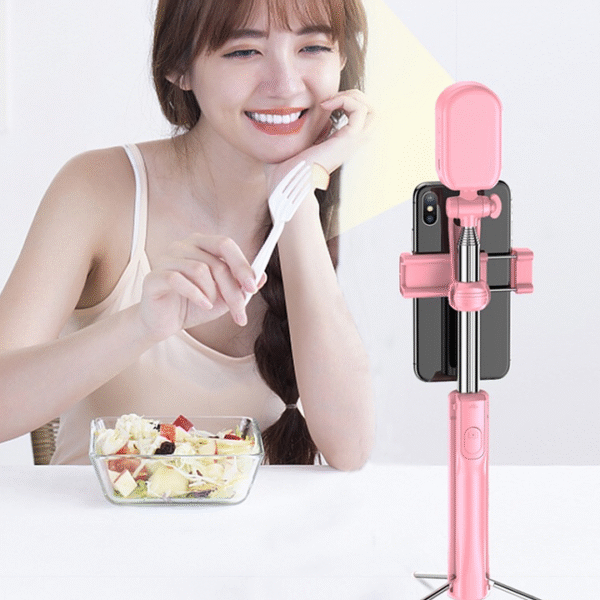 selfie-stick-with-bluetooth-remote-model.png selfie-stick-with-bluetooth-remote-model.png